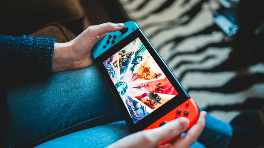 AMD Ryzen Z3 Handheld CPU Disappoints: What Gamers and Shoppers Need to Know 2 gamer playing portable device