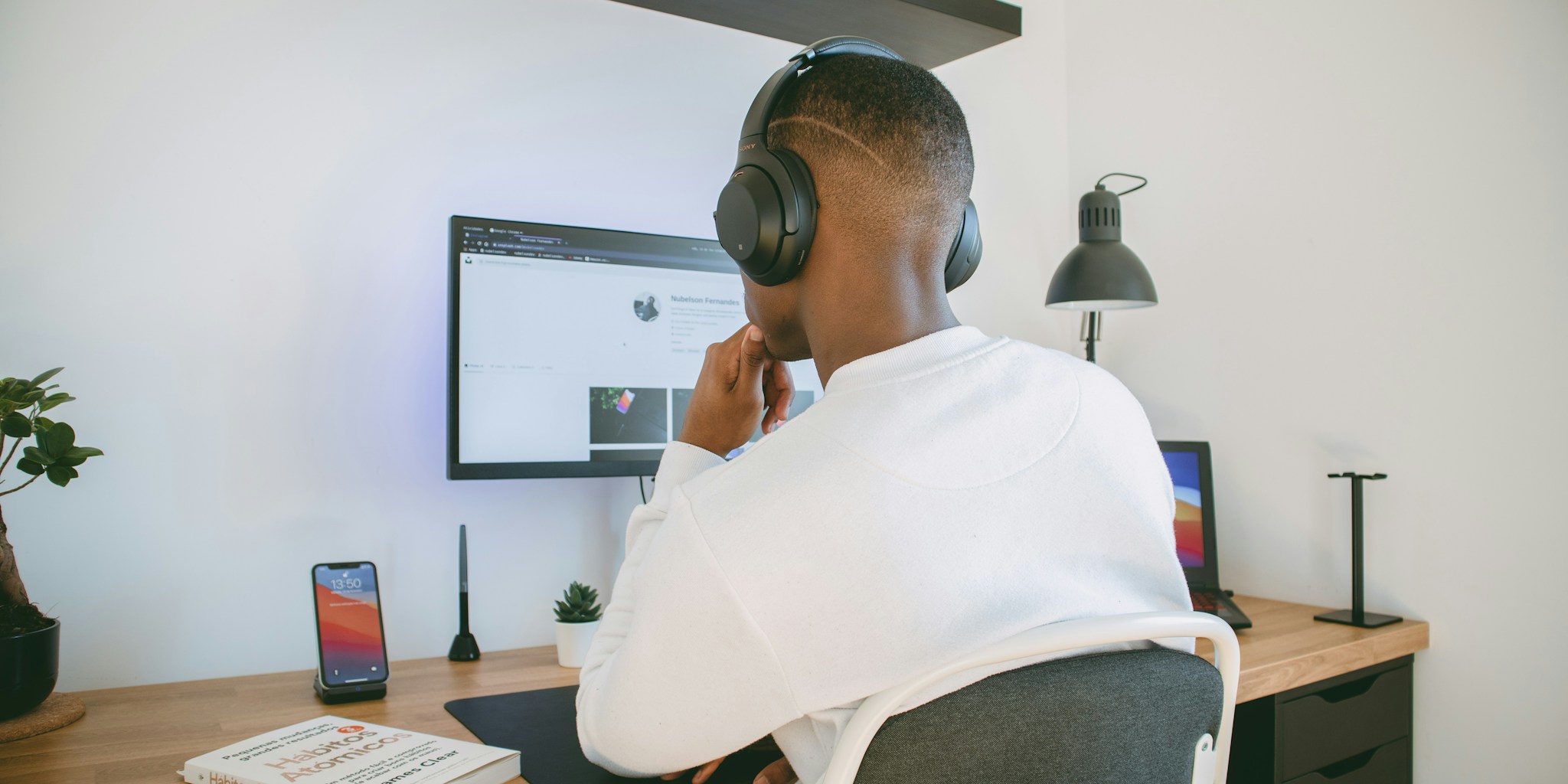 gamer wearing headset at desk