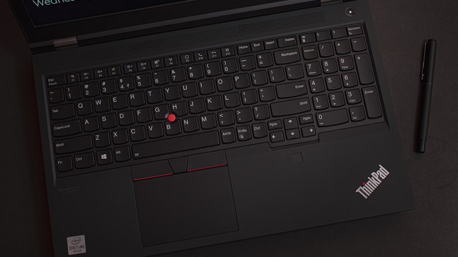 laptop with mechanical keyboard typing work