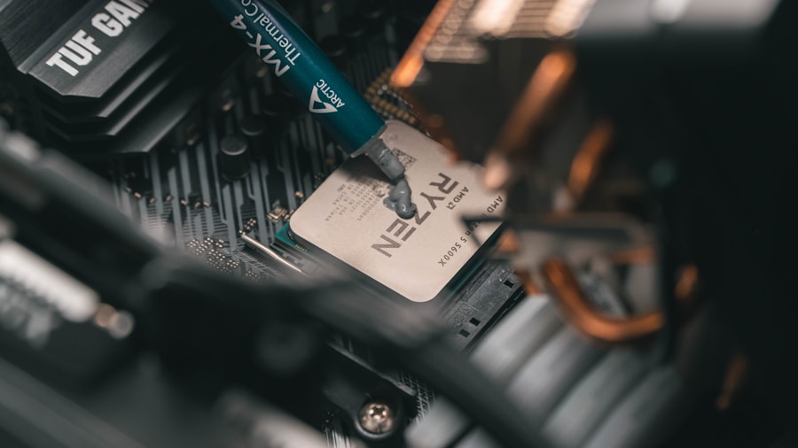 PC builder working on motherboard