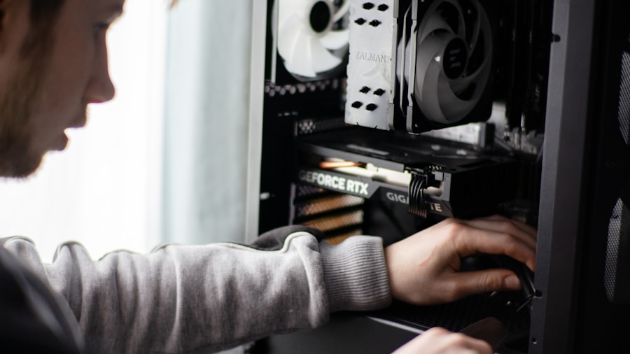 person assembling PC tower