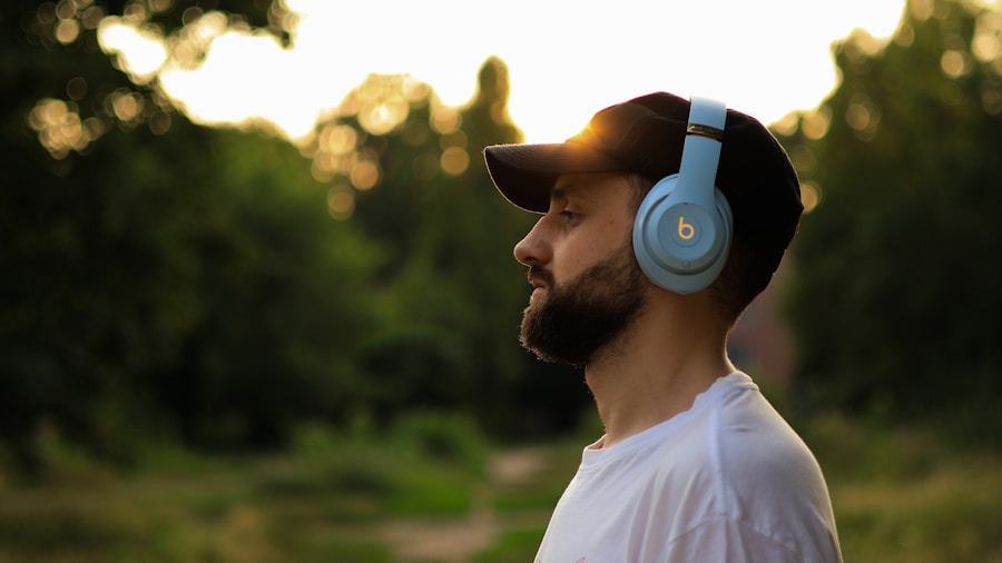 person listening to wireless headphones relaxing