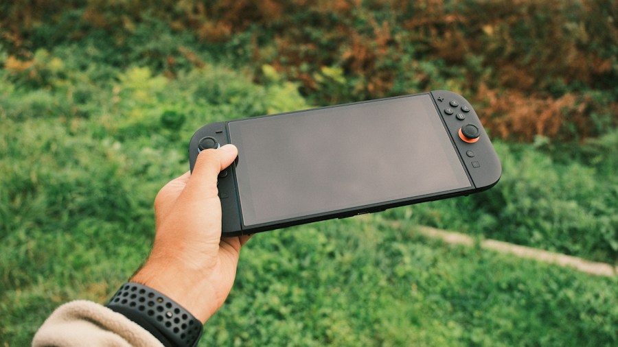 GeForce Now Arrives on Nintendo 3DS via New Mod: What Shoppers Need to Know 1 person playing nintendo handheld outdoors