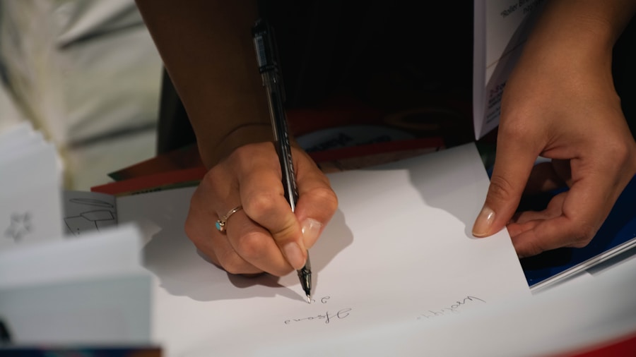 Steve Jobs signing documents