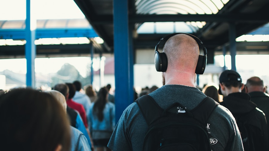 traveler listening with earbuds commuting